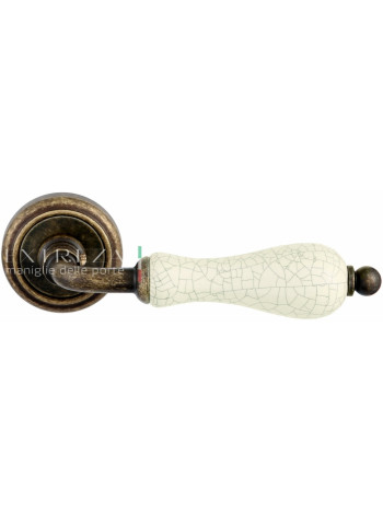 Ручка дверная на круглой розетке Extreza DANA CRACKLE (Дана кракле) 306  R01 Бронза античная F23