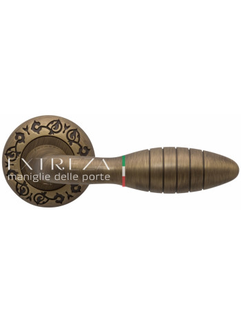 Ручка дверная на круглой розетке Extreza MIREL (Мирел) 316  R04 Бронза матовая F03