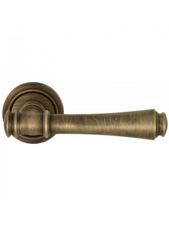Ручка дверная на круглой розетке Extreza PIERO (Пиеро) 326 R01 Бронза матовая F03