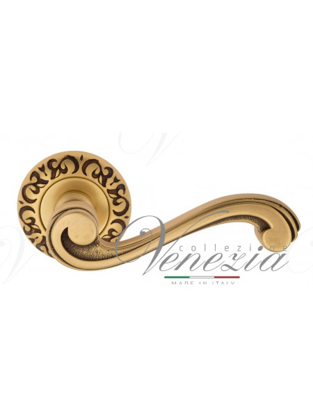 Ручка дверная на круглой розетке Venezia Vivaldi D4 Французское золото + коричневый
